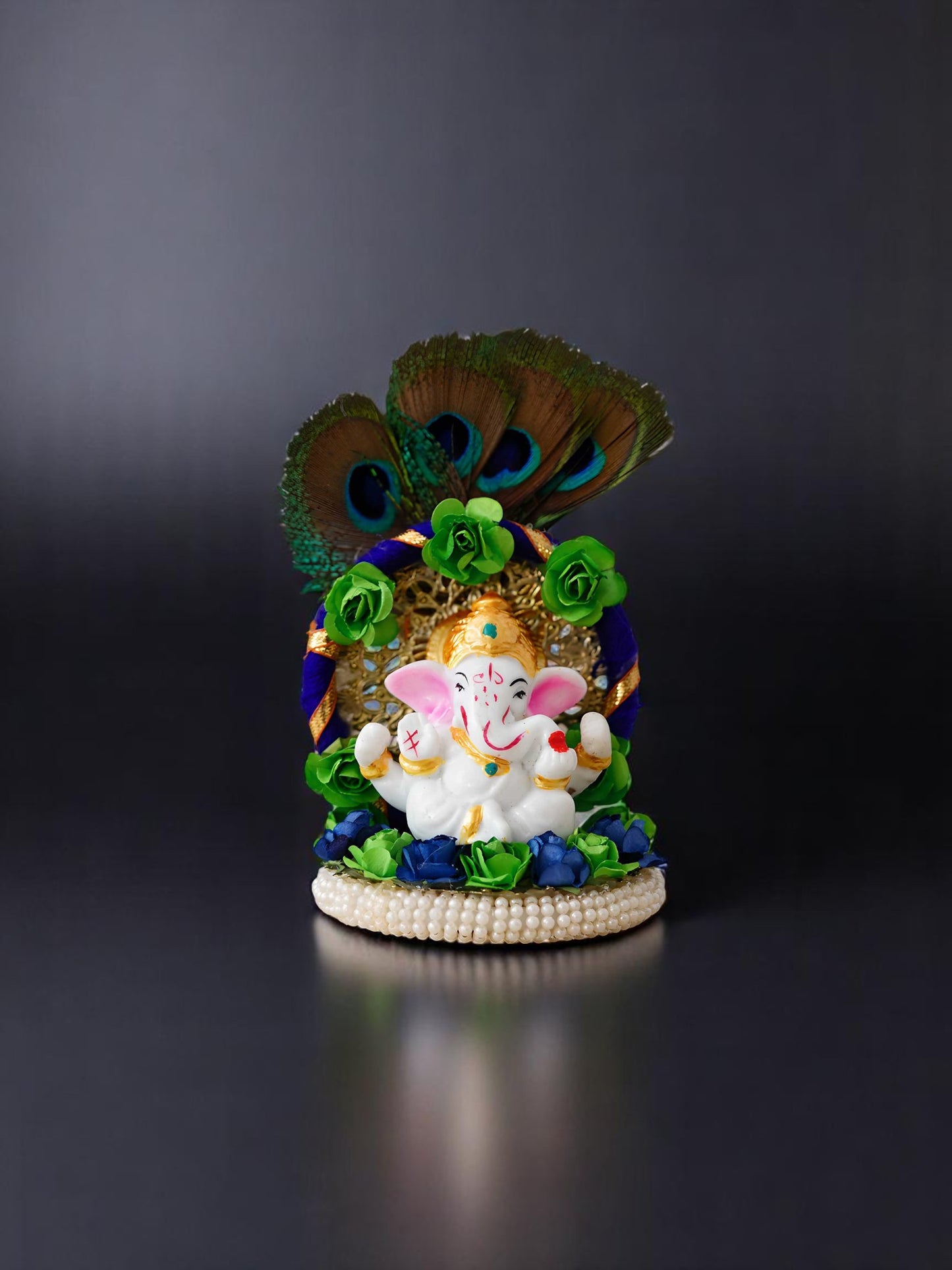 Lord Ganesha Idol on Decorative Handcrafted Floral Plate with Peacock Feather for Home and Car