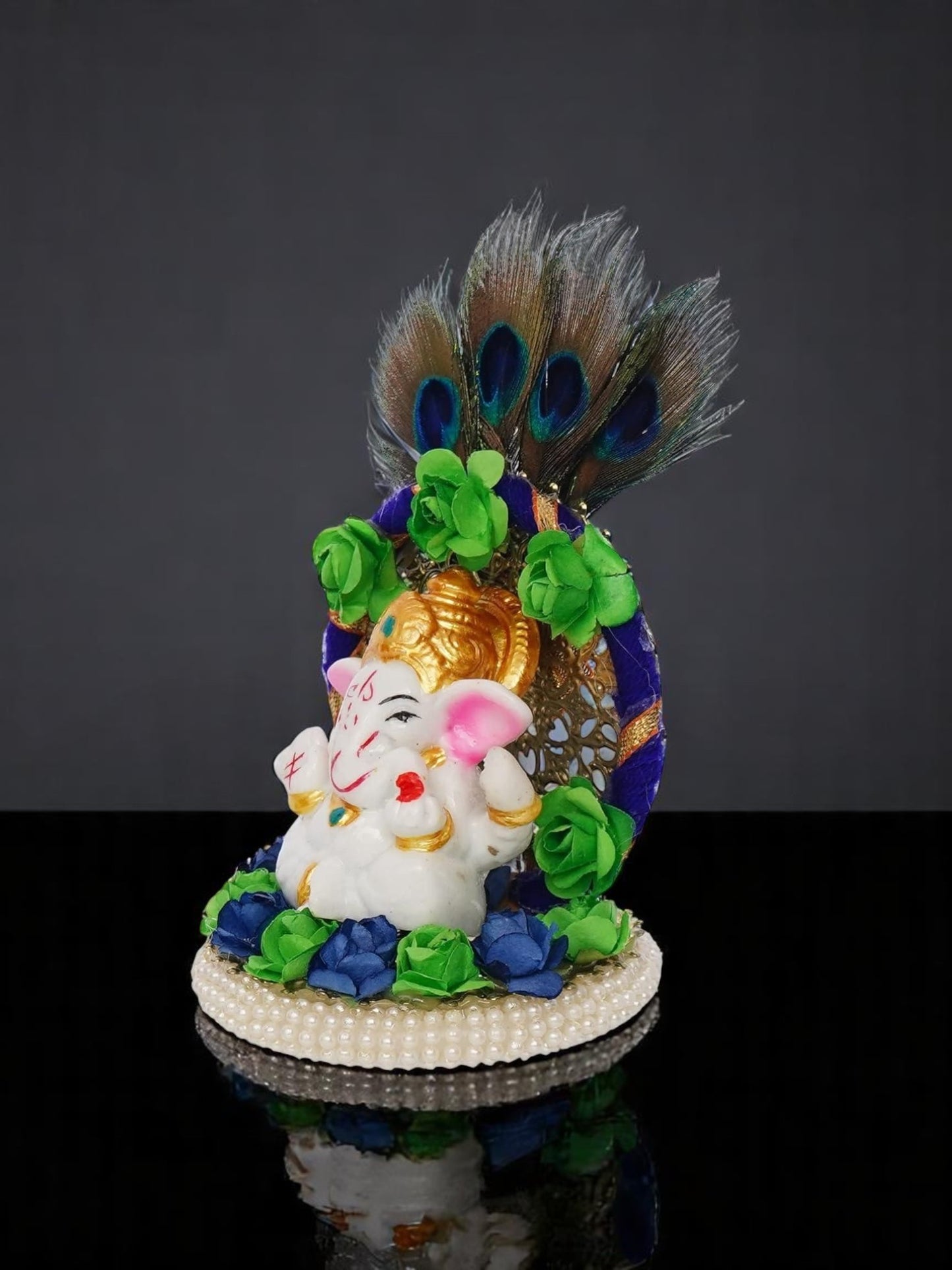 Lord Ganesha Idol on Decorative Handcrafted Floral Plate with Peacock Feather for Home and Car