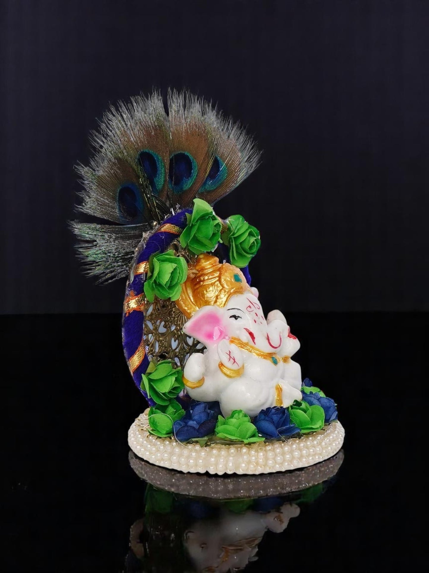 Lord Ganesha Idol on Decorative Handcrafted Floral Plate with Peacock Feather for Home and Car