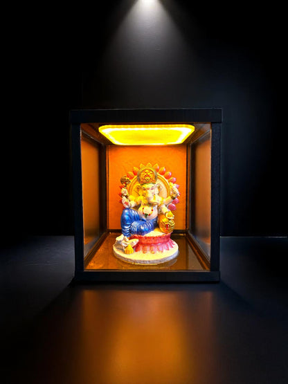 Divine Ganpati Bappa Idol with Lotus and Golden Ornaments