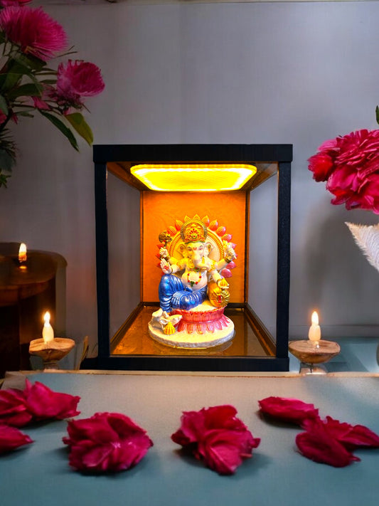 Divine Ganpati Bappa Idol with Lotus and Golden Ornaments