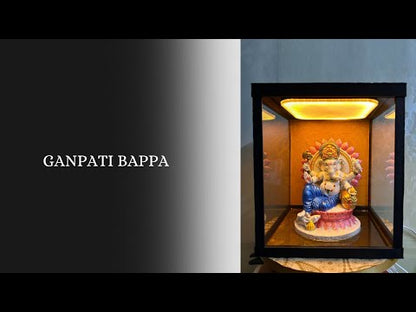 Divine Ganpati Bappa Idol with Lotus and Golden Ornaments